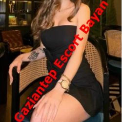 Promotional photo of a woman in a black strapless dress sitting in a bar; red text across reads 'Gaziantep Escort Bayan'.