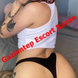 Advertisement image showing a woman in a white crop top and black thong posing on a bed, with red text 'Gaziantep Escort Bayan' across.