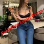 Woman in a black lace bralette and jeans at a bar, holding a wine glass; red diagonal text advertises Gaziantep Escort Bayan. Woman in a black lace bralette and jeans at a bar, holding a wine glass; red diagonal text advertises Gaziantep Escort Bayan.